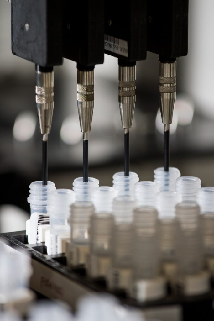 a group of plastic cups sitting on top of a machine