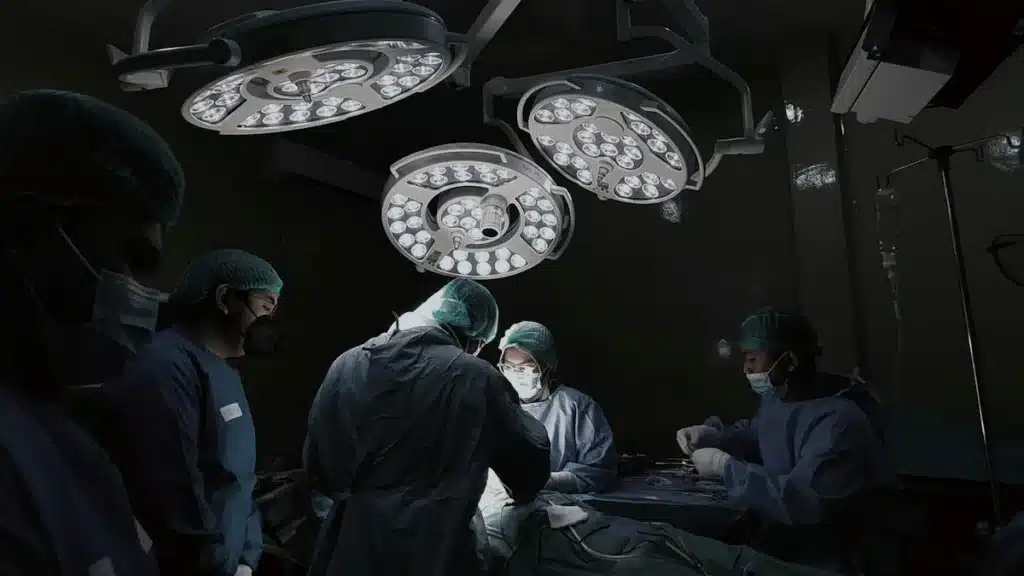 Medical billing professional reviewing cardiology claims at a desk